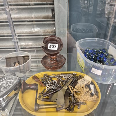 Lot 527 - A collection of watch keys, a wooden watch...