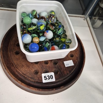 Lot 530 - A wooden solitaire board together with a...