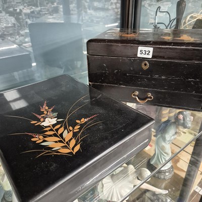 Lot 532 - Two Japanese black lacquer boxes with gilt and...
