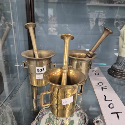 Lot 533 - Three 18th/19th century brass mortars and pestles