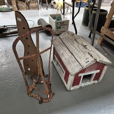 Lot 576 - Two wall mounting saddle racks together with a...