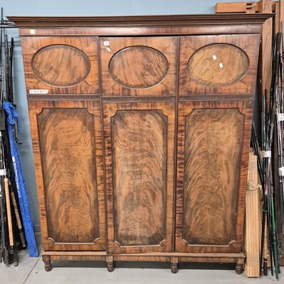 Lot 5 - A large early 19th-century flame mahogany...