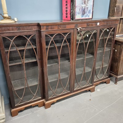 Lot 11 - A 19th century mahogany breakfront bookcase. H...