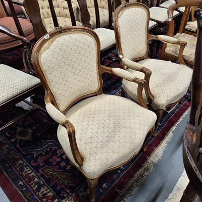 Lot 29 - A pair of french style salon armchairs.