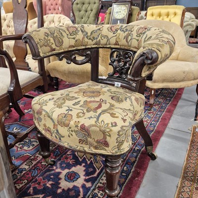 Lot 32 - An early Victorian library armchair with horse-...