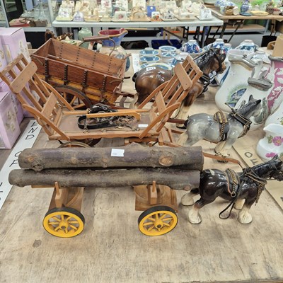 Lot 637 - Three wooden wagons drawn by pottery shire horses
