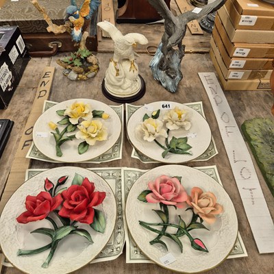 Lot 641 - Four Franklin Mint plates with raised rose...