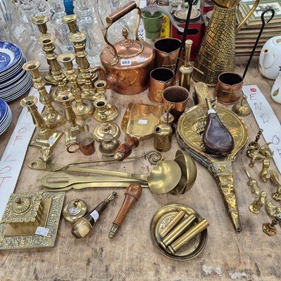 Lot 653 - Brass candlesticks, fire bellows, ladles and...
