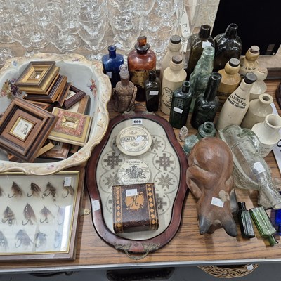 Lot 669 - Vintage glass and stoneware bottles, a pottery...