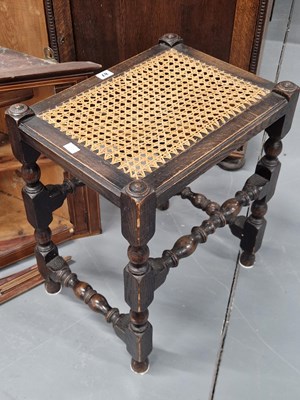 Lot 87 - A cane top oak stool