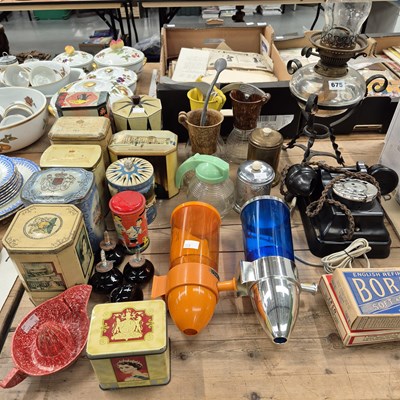 Lot 675 - A collection of vintage tins, two wall fitting...