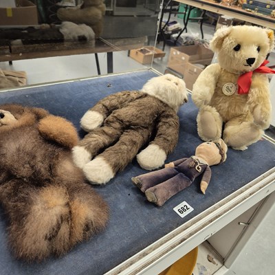 Lot 682 - Three teddy bears together with a Norah...