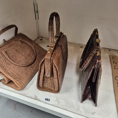 Lot 683 - Three crocodile finish handbags