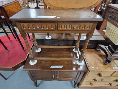 Lot 100 - A vintage oak two door washstand and a side table