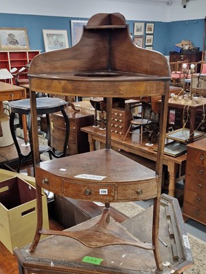 Lot 106 - A Regency mahogany corner washstand.
