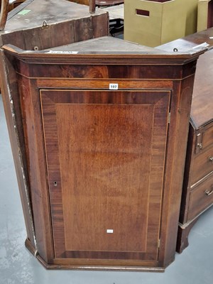 Lot 107 - A Georgian  crossbanded mahogany corner cabinet