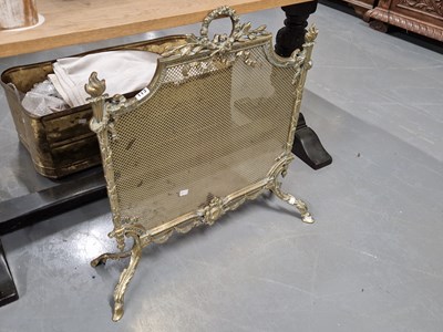 Lot 113 - A late Victorian brass fireguard.