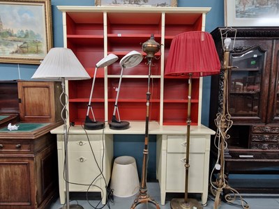 Lot 121 - A modern writing desk with a bookcase above.