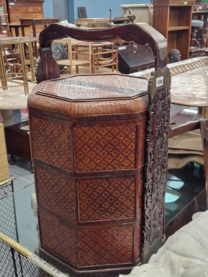 Lot 124 - An oriental food carrier.