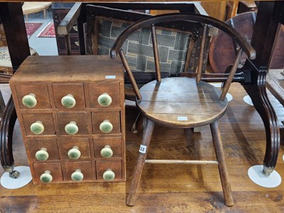 Lot 132 - A child's chair and a nest of spice drawers