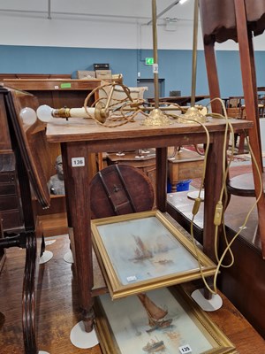 Lot 136 - An oak occasional table.