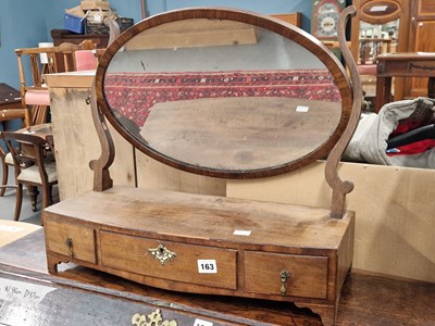 Lot 163 - A 19th century mahogany swing dressing table...