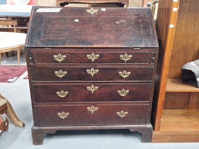 Lot 164 - A late 18th century oak bureau