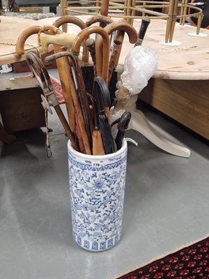 Lot 178 - An oriental blue and white stick stand and a...