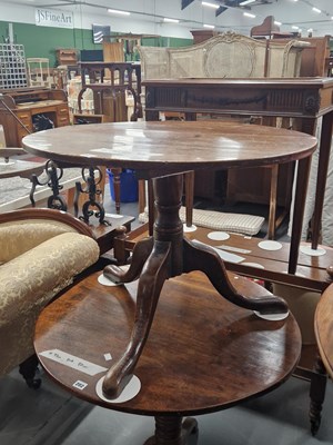 Lot 203 - A late  Georgian mahogany tilt top table.