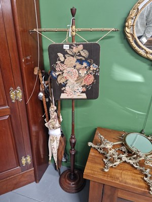 Lot 240 - A Victorian pole screen