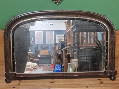 Lot 252 - An over mantle mirror