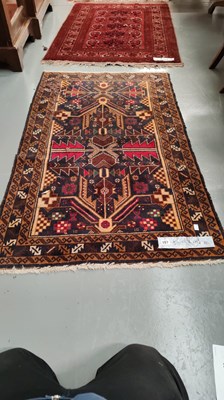 Lot 257 - A Belouch rug, 141 x 86.5cms