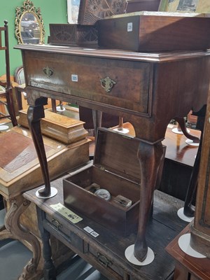 Lot 325 - An 18th century walnut side table with a...