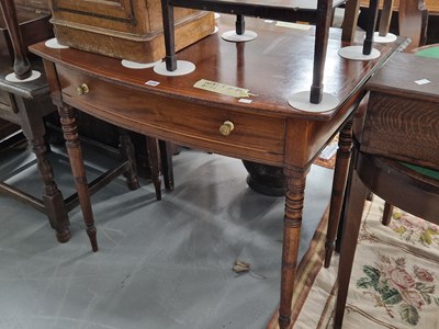 Lot 329 - A Regency mahogany bow front side table with...