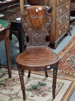 Lot 341 - An elegant Regency mahogany hall chair with...
