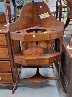 Lot 348 - A regency corner washstand