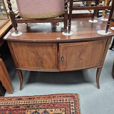Lot 356 - A mahogany bow-front washstand
