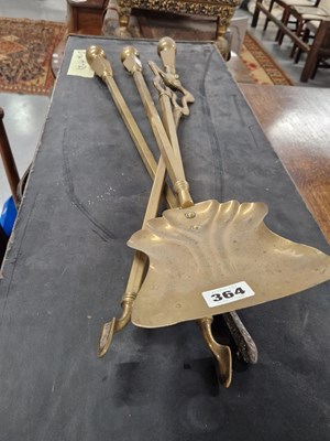 Lot 364 - A set of brass fire tools