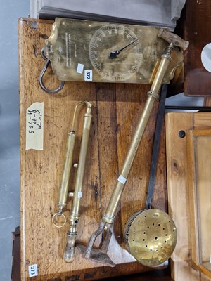 Lot 372 - A brass Salter spring balance, a brass warming...