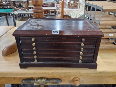 Lot 385 - A collector's cabinet