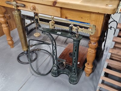 Lot 387 - A set of antique platform scales and a stirrup...