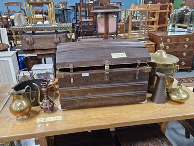 Lot 396 - A large metal trunk containing various brass...