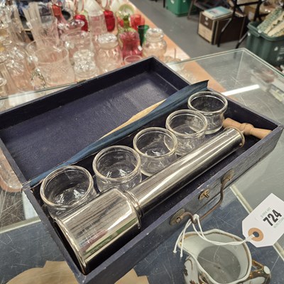 Lot 724 - A boxed cupping set