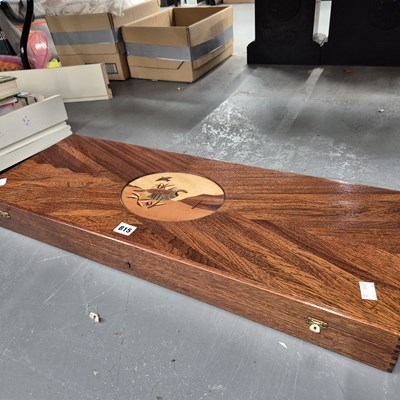 Lot 815 - A wooden shotgun case marquetried with a...