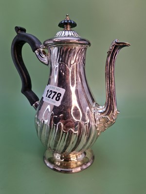 Lot 1278 - A hallmarked silver coffee pot