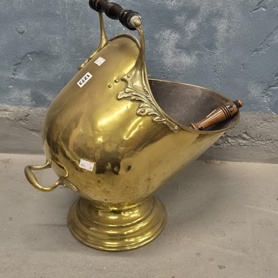 Lot 1273 - An antique Brass coal scuttle with scoop
