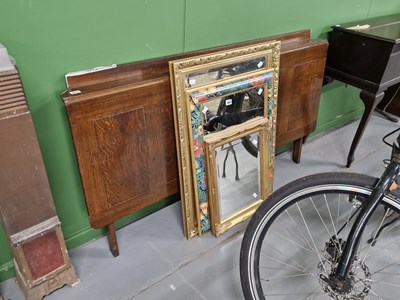 Lot 403 - An oak fold-down serving table