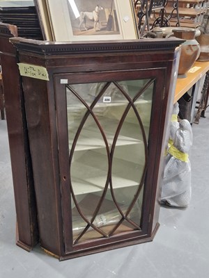Lot 406 - An antique glazed mahogany corner cabinet