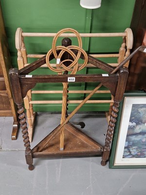Lot 432 - An oak corner stick stand, a carpet beater, a...