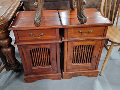 Lot 448 - A pair of bedside cabinets